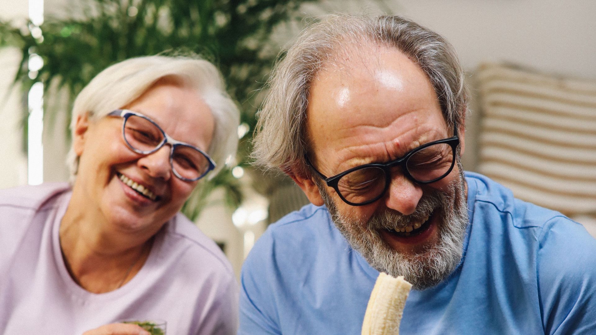 Retirement village lifestyle: residents laughing together after exercise